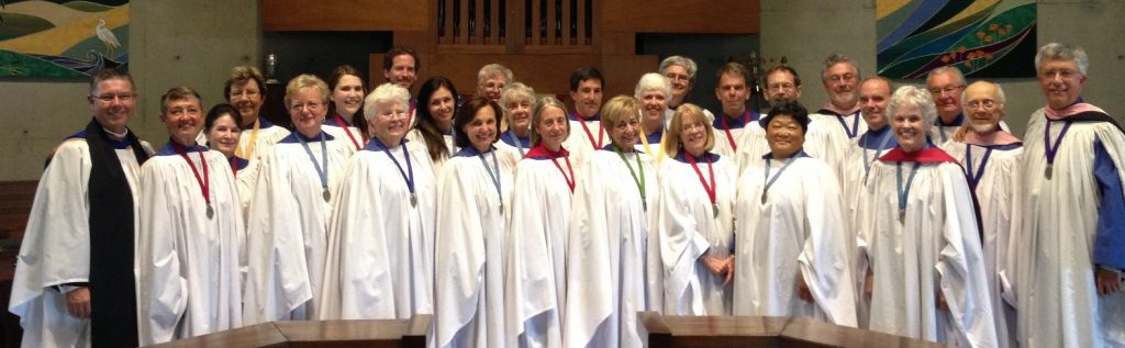 A large group of singers in choir robes.